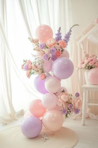 Celebrate in style with blush and bashful blooms, featuring beautiful balloon bouquets in shades of pink and lavender. Create a dreamy and enchanting atmosphere for your baby shower.