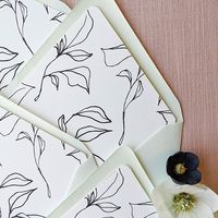 Simple floral envelope liner featuring flower line art in black and white, customize the color. Pairs perfectly with pale green wedding envelopes.