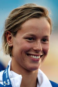 Federica Pellegrini Photos - Federica Pellegrini of Italy receives the gold medal during the medal ceremony for the Women's 200m Freestyle Final during the 13th FINA World Championships at the Stadio del Nuoto on July 29, 2009 in Rome, Italy. - Swimming Day Four - 13th FINA World Championships