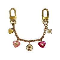 Used Louis Vuitton Jewel Sack Chain M01000 Charm Women's Accessories (Sku: Gzl14nx9) === General === Brand : Louis Vuitton Model : M01000 === Design === Type : Key Chain Gender : Women Color : Gold, Pink === Included Items === Accessories : Box, Dust Bag Accessories Notice : Before Purchasing, Please Refer To The Images Of The Accessories Included With The Item. === Condition === Condition : Used (Very Good) Ranking : Rank A Used - A Few Traces Of Usage, Some Scratches / Dirt Can Be Seen But Overall In Very Good Condition Seller Ranking : Rank A Overall Scratches : Slight Overall Dirt : Slight Overall Traces Of Use : Slight Condition Notice : Before Purchasing, Please Refer To The I