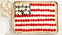 This patriotic pie will have your Fourth of July guests seeing stars! A cream cheese-white chocolate pudding base gets topped with fresh berries and sparkly pie crust cutouts for a dessert that’s (almost) too pretty to eat.