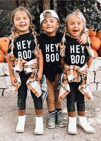 "Hey Boo" is part of our Fall collection. This shirt is a modern and minimal design tailored to all kids during the fall season. Split hem with a slightly longer back Ultra-soft, 100% Cotton Top. The shirt is a unisex fit, true to size.  Each garment has a custom neck label and a seam label Hang tags are attached to the neck label