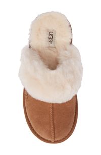 A soft, genuine-shearling cuff and plush UGGpure lining add to the cozy warmth of a cute scuff slipper grounded by a sunburst-logo tread. Lightly padded footbed UGGpure is a textile made entirely from wool to feel and wear like genuine shearling Leather and genuine-shearling upper/UGGpure wool lining/synthetic sole Shearling may be sourced from Australia, China, Italy, New Zealand, Spain or USA. See packaging for confirmed country of origin Imported Kids' Shoes