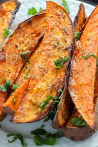 Extra Crispy Sweet Potato Wedges - oven baked and made with simple ingredients. These are SO addicting!