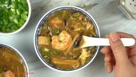 A classic fully loaded home-cooked Hot and Sour Shrimp Soup full of tender mushrooms and juicy shrimp.