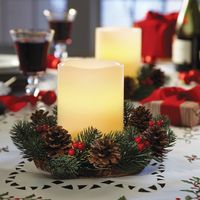 Led candle in a wreath table centerpiece