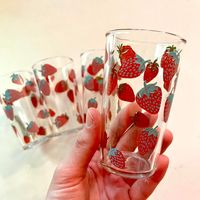 Vintage set of four adorable little strawberry juice glasses. 3.75 inches tall. For first dibs on more groovy 70s clothes and colorful vintage goods, check out my Instagram @magicbusvintage. 70s 60s 1960s hippie groovy retro sunset drink ware cups tumblers bar ware kitchen kitchenware 1970s 60s hippie kitchen drinking glasses cups tumblers kitchenware bar bar ware 1960s