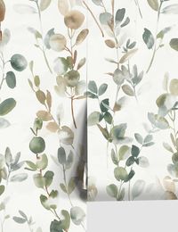 Add a touch of refinement to your look with this botanical wallpaper. Trailing eucalyptus sprigs offer lush greens and silvery undertones for fresh sophistication. Style this wallpaper in your entryway or a sunlit study to reflect the beauty of the natural world.