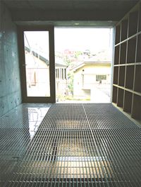 steel mesh industrial flooring entry from garage