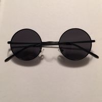 Never Worn Circle Framed Black Sunglasses With A Thin Frame.