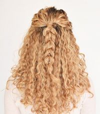 9 Easy On-the-Go Hairstyles for Naturally Curly Hair: We've found you a wide variety of looks to choose from. And yes, one even involves a scrunchie. (But a chic one at that.) Keep scrolling to see all your options. #CurlyHair #Hairstyles #Hair #CurlyHairstyles