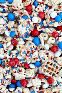 What's better than patriotic M&M's? Patriotic Party Party Mix! The best sweet and salty snack mix ever gets a patriotic pop with red, white and blue M&M’s and sprinkles. Always a huge hit! #patrioticsnack #snackmix