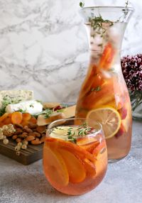 Sparkling-Peach-and-Thyme-Rose-Cocktail-1