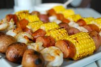 An easy, summer dinner. Shrimp, sausage, corn and potato kebabs