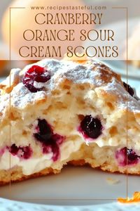 Delight in these tender and flaky cranberry orange sour cream scones, bursting with sweet cranberries and a hint of citrus. Perfect for breakfast, brunch, or as a delightful snack!