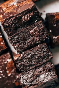 These extra fudgy dark chocolate brownies have a deep and rich flavor that's balanced with a sprinkle of sea salt. The texture is fudgy but tender, and each bite is loaded with dark chocolate. They're simply irresistible! #darkchocolate #brownierecipe #brownies #fudgy #butternutbakery | butternutbakeryblog.com