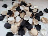 "Your set of Dark Moody Boho Rose petals will include Black, Beige, and Ivory satin petals.  This stunning combo of flower petals are perfect for flower girl tossing, scattered on reception tables, or used as Wedding Aisle Decor. We offer our gorgeous petals in several styles and color combinations that you can Customize by adding additional colors or omitting a color/s. This allows you to create a Perfect set that is unique for you on your Special Day! CLICK HERE: to view other Boho Petals https://www.etsy.com/listing/933932562/boho-wedding-decor-beige-taupe-ivory   Your Rose Petals are ideal for: * Flower Girl Tossing * Wedding Aisle Decor * Wedding table decor / Memory Table * Ceremony Decor/ Alter / Sweetheart Table * Bridesmaid Proposal & Flower Girl Proposal  * Confetti Tossing: leav