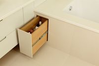 Space-saving in the bathroom is trickier than in the kitchen, so it’s best to focus on making the most of what you already have, such as using the void under a standard bath, which can be turned into a small storage cupboard for cleaning products.