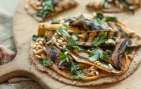 Vegetables soaked in a rich hummus marinade and then grilled make a superb topping for these tortilla pizzas, but you could also buy prepared grilled vegetables and just give them a sprinkling of balsamic vinegar.