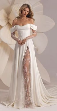 Osez l'originalité, marquez les esprits de vos convives et captivez le regard de votre futur époux ! Dans cette nouvelle collection, Axelle est une robe de mariée styliste, réalisée dans un duo exquis de matière noble, le satin et de dentelle, déclinée dans deux nuances que vous pourrez porter au choix, selon votre teint, en ton ivoire (telle que la photographie) ou en ton blanc. Cette robe de mariée épouse parfaitement les courbes et révolutionne avec élégance les traditions. Axelle incarne la modernité et la féminité. Elle se démarque par son bustier de style corset, en satin joliment drapé, légèrement échancré afin d'entrevoir son feston en dentelle. La dentelle se poursuit sur les manches toutes en transparence harmonisant les bras pour un rendu spectaculaire. Les mancherons drapés en