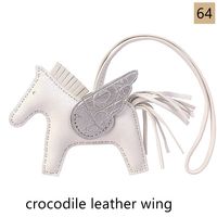 These horse bag charms are hand-sewed with high quality lambskin leather (body and string), with crocodile leather wing or ostrich leather wing. 50 colors. 
#awulook #awulookstrap #bagcharm #minihorse #miniflyinghorse #hermes