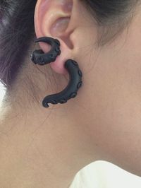 These are so weird, but I kinda like them... Wrap Around Octopus Earrings by Pyxy on Etsy, $12.00