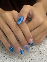 Almond shaped acrylic nails blue and nude blooming gel with 3d french and airbrush