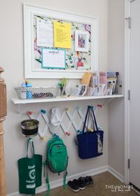 Command center with a shelf for extra storage. Via The Homes I Have Made.