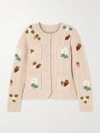 Sea’s ‘Callie’ cardigan has been lovingly crafted, so it’s a piece to be treasured. Influenced by vintage patterns, it’s cable-knitted from soft wool and finished with crocheted trims and colorful fruits and flowers.