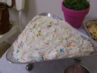 Dunkaroo Dip. 1 box funfetti cake mix, 1/2 container plain yogurt, 1/2 container of cool whip. Serve with animal crackers, graham crackers. This could be dangerous!