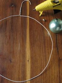 shut the front door! i didn't know it was THIS easy to make those adorable ornament wreaths! good afternoon, homemade christmas presents. =)