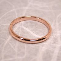 14k Rose Gold Band Modern Romantic Pink Gold Ring Wedding Band by SARANTOS. $240.00, via Etsy.