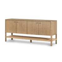 Simple yet refined, a Danish design-influenced sideboard is made from solid ash, with iron hardware finished in a sleek gunmetal. Stretcher-style shelving made from woven paper cord serves up a textural finishing touch.Product overview Color: Dune Ash Dimensions: 18"D x 72"W x 32"H Materials: Solid Ash,Iron,Rush Weight