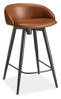 With its elegant silhouette, our Sylvan leather swivel stool looks great from all angles and complements any bar space. The low-profile curved back provides comfortable support, while the durable upholstery and steel legs ensure long-lasting modern beauty. Swivels 360 Degrees > Swivels 360 Degrees