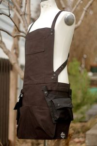 This multi purpose apron features adjustable crossing shoulder straps, for a customized fit. Has sectional flaps in front, for maximum coverage and is super easy to move in ( bending, squatting - all of it) Great for those who may need to layer up when wearing for outdoor use, as the