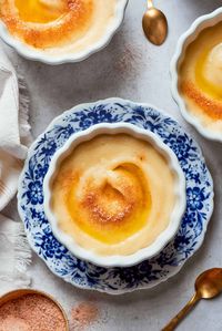 Rømmegrøt is a warm Norwegian porridge, similar to a rich milk pudding, that's wonderful with a drizzle of melted butter and a good sprinkling of cinnamon. It's a longtime family tradition, and makes a great side dish or hot breakfast.