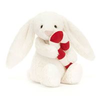 Bashful Bunny With Candy Cane is bringing a pop of festive color, with a squashy fur cane in cream and scarlet stripes. This vanilla bunny is so soft, with cuddly paws, a fluffy tail and long, flopsy ears. Under the tree or inside a stocking, this Christmas helper's a gorgeous surprise. Features  Dimensions: 7.1in x 3.5in x 3.1in Sitting Height: 5in Main Materials: Polyester Inner Filling: Polyester Fibers, PE Beans Hard Eye Care Instructions: 86 degree Fahrenheit wash only. Do not tumble dry, dry clean, or iron. Check all labels upon arrival of purchase Safety Recommendations: Suitable from birth Tested to and complies with EN71, ASTM, and ISO 8124