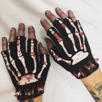 Halloween Hands from ChadCherryClothing. Fingerless skeleton hand studded gloves.