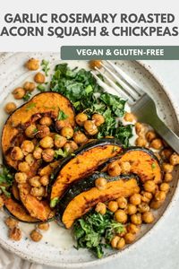 This tray of Garlic Rosemary Roasted Acorn Squash and Chickpeas is an easy vegan sheet pan dinner that cooks in 35 minutes. A full meal loaded with fall flavors and will make you feel satisfied with every bite.