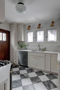 Brass pendant lighting. White cabinets and trim. Checkered tile flooring. White quartz countertop. Kitchen inspiration. Beautiful natural light.