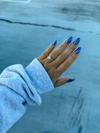 Blue chrome almond shape nails