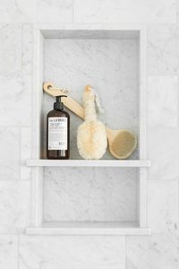 Traditional master bath with open doors and dark navy wallpaper, double sconce, double vanity | Studio McGee Design