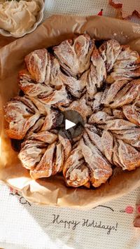 4.6M views · 576K reactions | My four layer cinnamon roll snowflake was so loved last holiday season! ❄️ It’s fun to make and absolutely delicious. I used cinnamon roll dough for this, but you can take a shortcut with puff pastry. I have a full tutorial on my blog with tips on how to make it ahead and how to make it both with cinnamon roll dough and with puff pastry! Search “cinnamon roll snowflake” on my blog and it will come up, or comment below and I can send you the link. 

Full recipe: https://bestlittlemoments.com/the-viral-cinnamon-roll-pull-apart-snowflake/

Holiday tea towel from @geometry.house - use SARAHR15 to save. 🎄

You can access my recipes by tapping my blog link in profile (Best Little Moments). You can also type sarahtreed.com or bestlittlemonents.com into your browser 