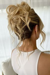 Modern french twist with lots of texture for bridal hair. The pammy pile up