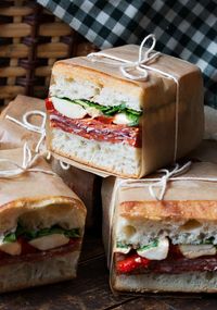 How to Make Pressed Italian Picnic Sandwiches - Perfect picnic sandwiches, these Pressed Italian Picnic Sandwiches are great for Summer eating, whether a BBQ or a picnic. Easy to make ahead and they travel well! #picnic #sandwiches #pressed