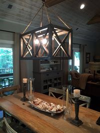 Our XX Chandelier wood light fixture with Edison bulbs and crisscross designs…