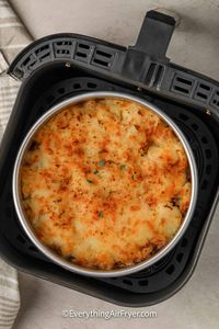 The best shepherd's pie recipe is on the table in minutes without heating up the stove or oven! Shepherd’s pie can be prepared fresh, but it’s also a great way to use up leftover meat and vegetables, gravy, or mashed potatoes. Super versatile, air fryer shepherd’s pie can be assembled in advance. Then when the guests arrive, start cooking it in the air fryer for a hearty meal! #bestshepherdspierecipe #airfryershepherdspie #easyrecipes #everythingairfryer