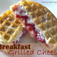 Breakfast Grilled Cheese. (frozen waffles, cream cheese, and jam)