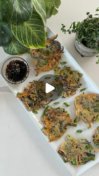 Maxine Sharf on Instagram: "Grandpa's Korean vegetable pancakes✨

For the Sauce:▪️2 Tbsp Soy Sauce▪️1 Tbsp Fresh Lemon Juice▪️1 tsp Water▪️1/2 tsp Sugar▪️1 Tbsp Sesame Oil▪️1 tsp Sesame Seeds▪️

For the Pancakes:▪️1 Cup Flour▪️1/2 tsp Kosher Salt▪️1 Cup Water▪️1 Cup Leek Greens, sliced thin▪️1/2 Cup Carrot, grated▪️3 Scallions, sliced in 1” pieces▪️1/2 Cup Red Cabbage, sliced in thin 1" strips▪️1 Jalapeño, seeds removed sliced in thin 1” strips▪️2 Tbsp Avocado Oil▪️

1️⃣ In a small bowl, mix together the ingredients for the sauce and set aside.
2️⃣ In a large bowl, whisk together the flour, salt, and water to create the batter. Add the veggies (leeks, carrot, scallions, cabbage, and jalapeño) and mix until combined.
3️⃣ Preheat a large pan over medium heat and add the avocado oil. Working 