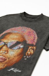 RODMAN BRAND keeps you fly with the new Chroma Shades T-Shirt. This tee features a crew neckline, short sleeves, a vintage wash, and Dennis Rodman graphics printed on the front.   	Crew neckline 	Short sleeves 	Oversized fit 	Vintage wash 	Front graphic 	100% Cotton 	Machine washable